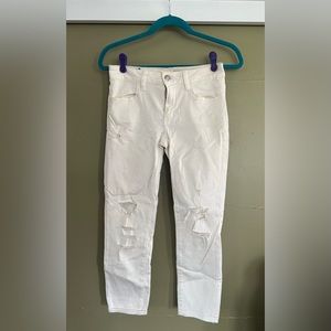 Ripped and torn woman’s jeans